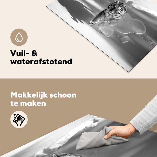 KitchenYeah® Inductie beschermer 76x51.5 cm - Tijger - Jacht - Sneeuw - Zwart - Wit - Kookplaataccessoires - Afdekplaat voor kookplaat - Inductiebeschermer - Inductiemat - Inductieplaat mat
