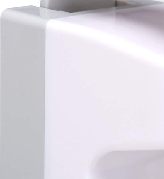 Close-up van de witte, glanzende behuizing van een zeepdispenser.
