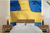 Behang - Fotobehang Close-up van de vlag van Zweden - Breedte 260 cm x hoogte 260 cm