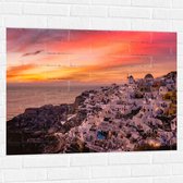 Muursticker - Uitzicht over Klassieke Griekse Stad tijdens de Zonsondergang - 100x75 cm Foto op Muursticker