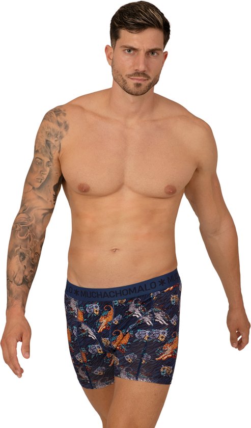 Donkerblauwe Muchachomalo boxershorts met paarse en oranje paisleyprint en pantermotief.