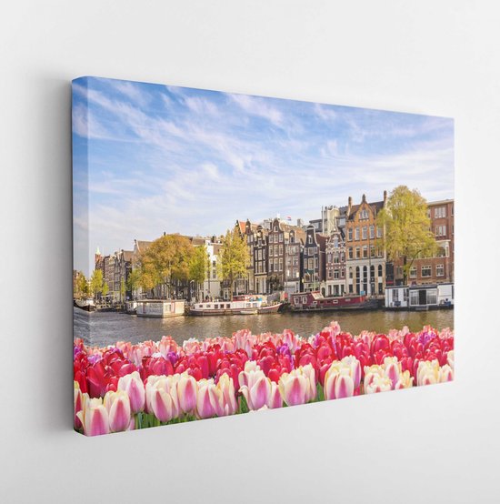 Amsterdam, Nederland, skyline van de stad aan de waterkant van het kanaal met lentetulpbloem - Modern Art Canvas - Horizontaal - 1017832351 - 130*90 Horizontal