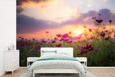 Behang - Fotobehang Bloemen - Roze - Zonsondergang - Natuur - Weide - Horizon - Breedte 360 cm x hoogte 240 cm