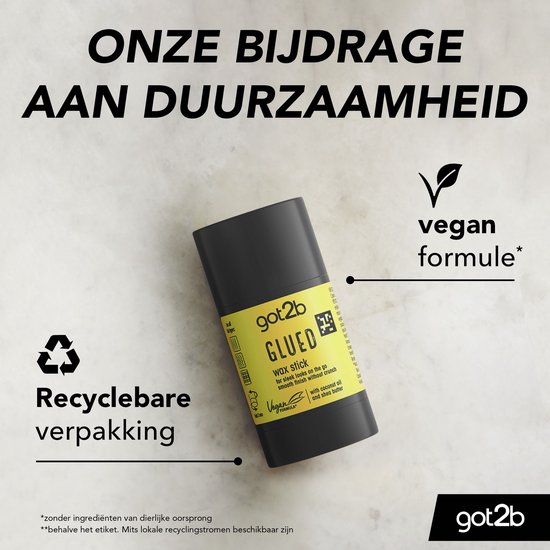 Zwarte tube met gele wikkel met Got2b Glued wax stick, vegan formule en recyclebare verpakking.