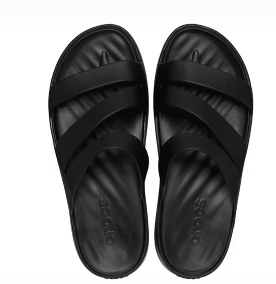 Dessus de claquettes Crocs noires avec brides croisées et logo.