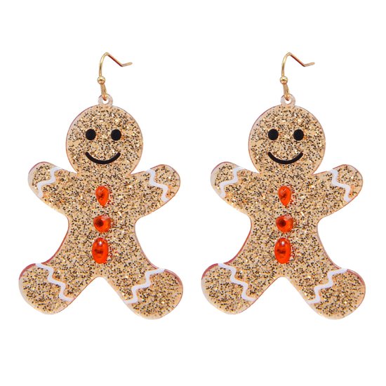 Boucles d'oreilles bonhomme de pain d'épice pailletées dorées avec détails blancs et pierres orange.