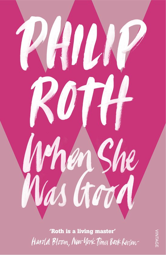 Boekomslag: 'When She Was Good' door Philip Roth in witte letters op een roze achtergrond met geometrisch patroon.