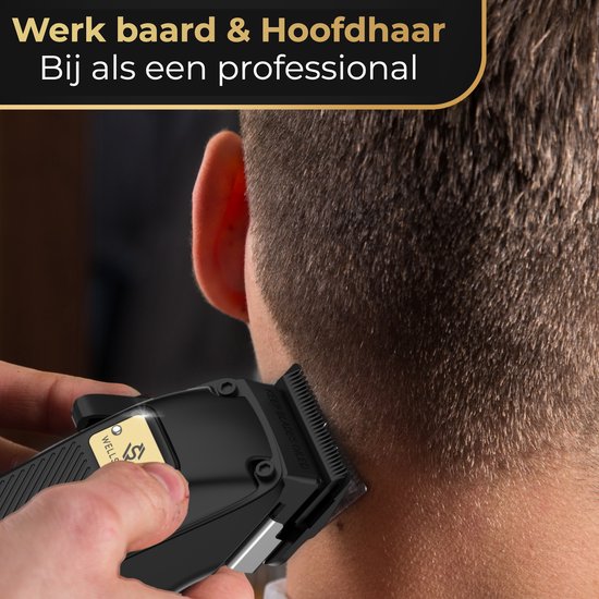 Close-up van een zwarte tondeuse die het haar van een man achter zijn nek trimt.