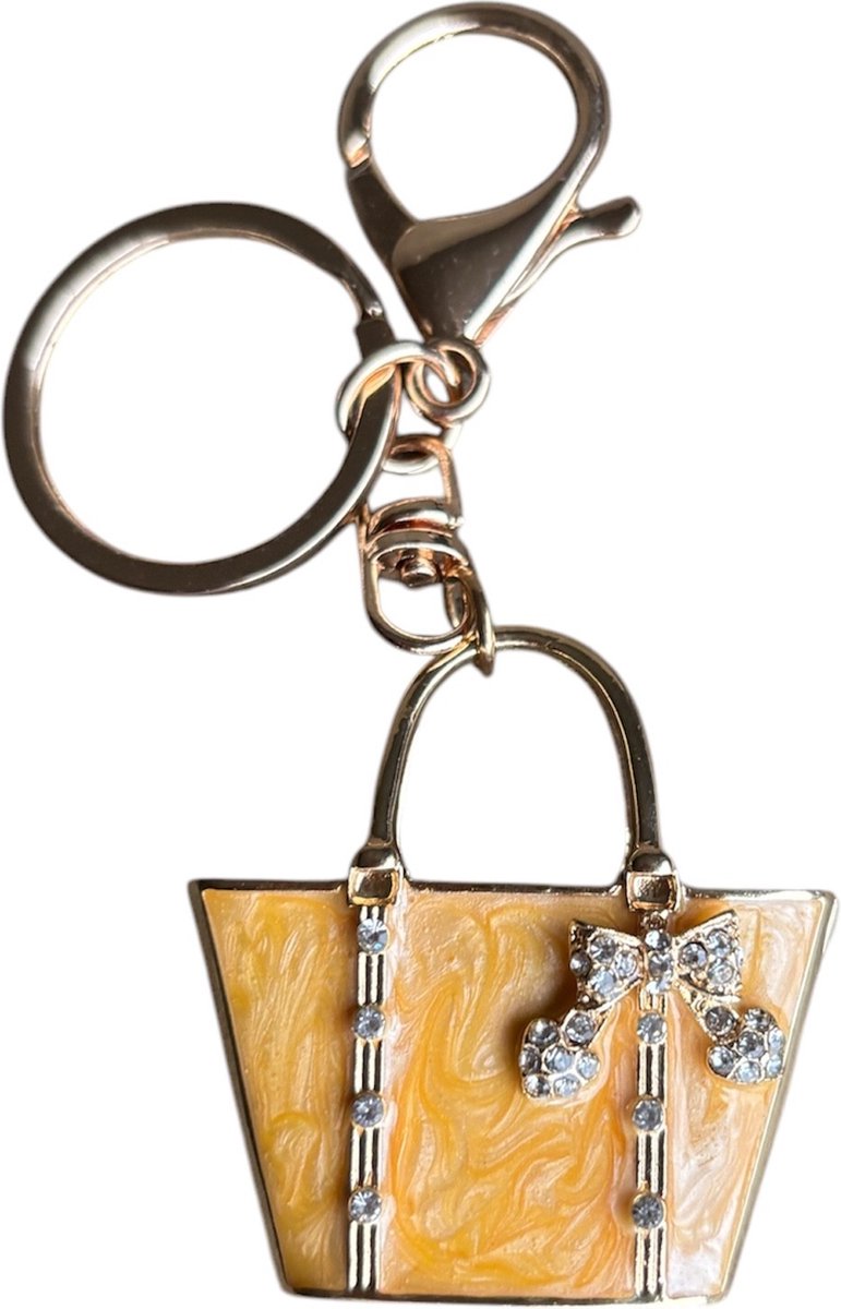 Sleutelhanger Tas Okergeel met Strass strik ( Goudkleurig ) 4.5 x 4.5 cm