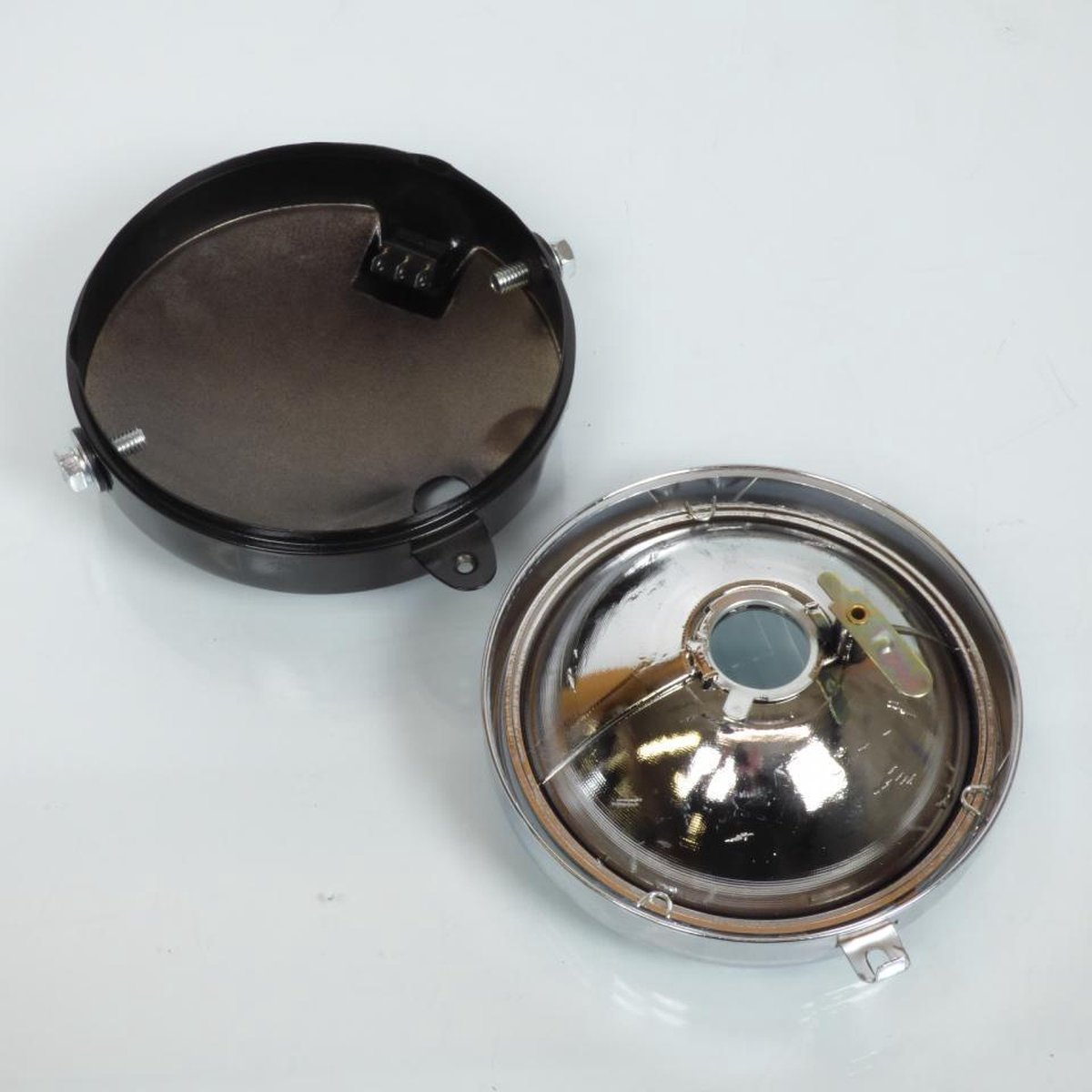 front optic rsm voor bromfiets zwart Ø145 transp + inter nieuw