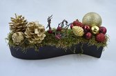 Kerststuk in zwart aardewerk potje: 27 x 7 x 5 cm