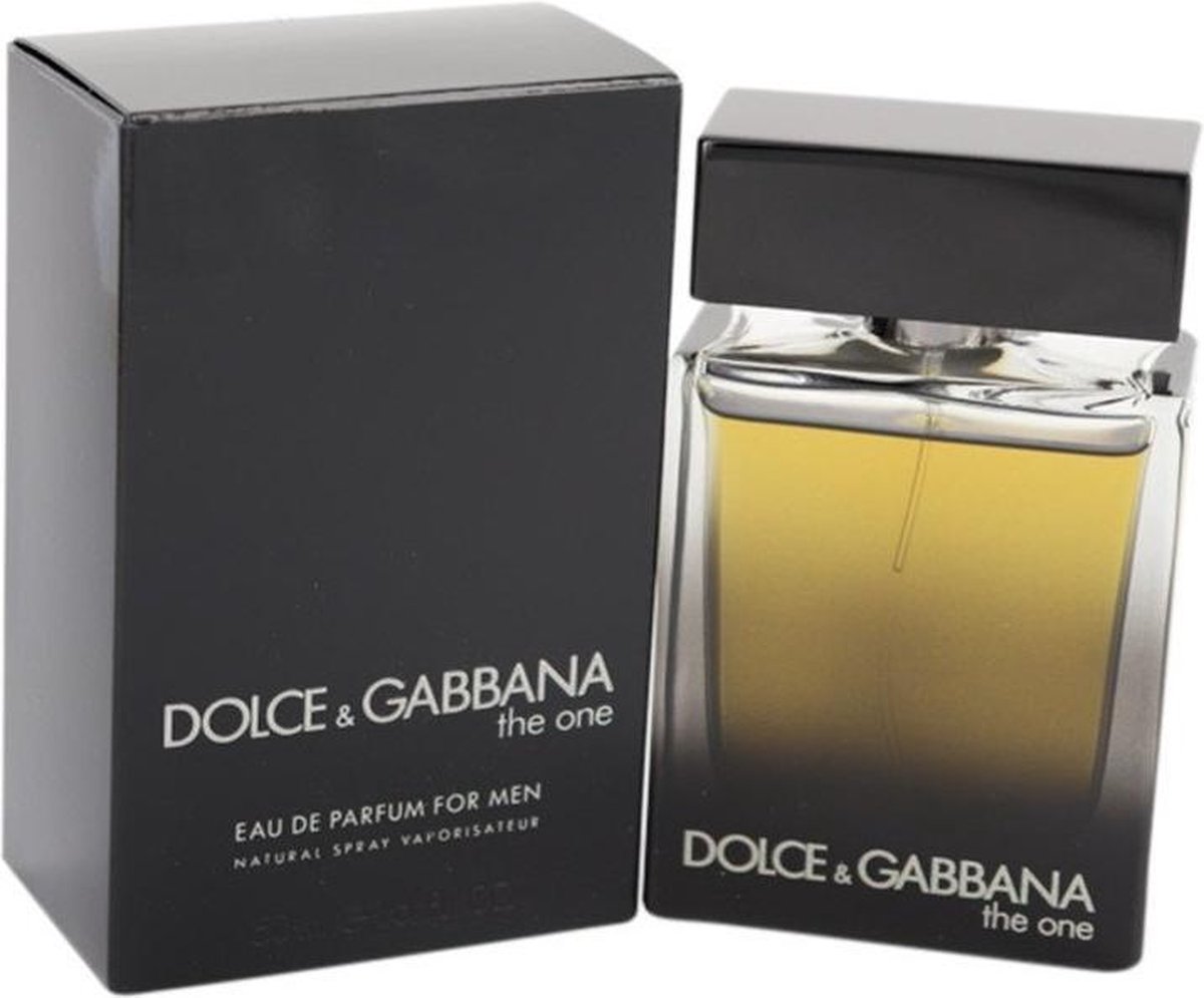 Dolce &amp; Gabbana The One Eau de Parfum voor mannen: een amberkleurig parfum in een rechthoekige glazen fles met zwarte dop.