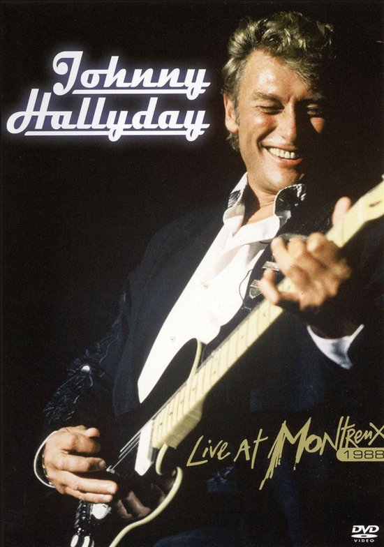 Johnny Hallyday, Live at Montreux 1988 DVD-hoes. Een glimlachende Johnny Hallyday met gitaar.