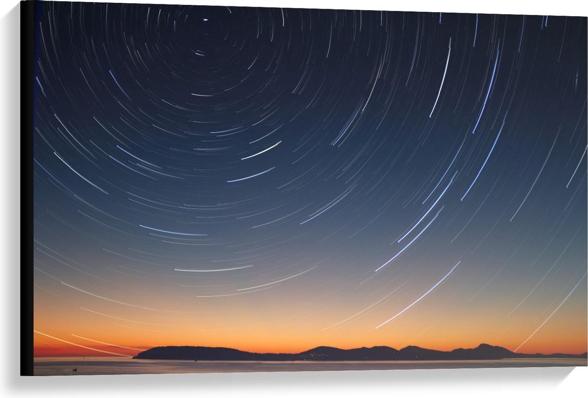 Canvas - Lichtcirkel boven Bergen - 90x60cm Foto op Canvas Schilderij (Wanddecoratie op Canvas)