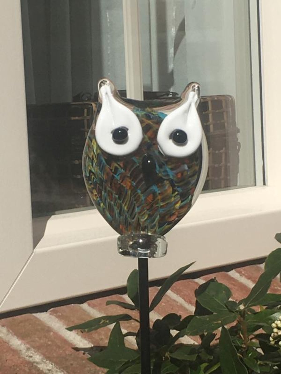 Uil van glas op steker