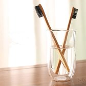 Bamboe tandenborstel set - 4 tandenborstels per set - zachte haren - houtskool - volledig biologisch afbreekbaar - milieuvriendelijk - 100% BPA vrij