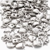 Zilveren bedels. afm 15-20 mm. gatgrootte 3 mm. 80 gr/ 1 doos