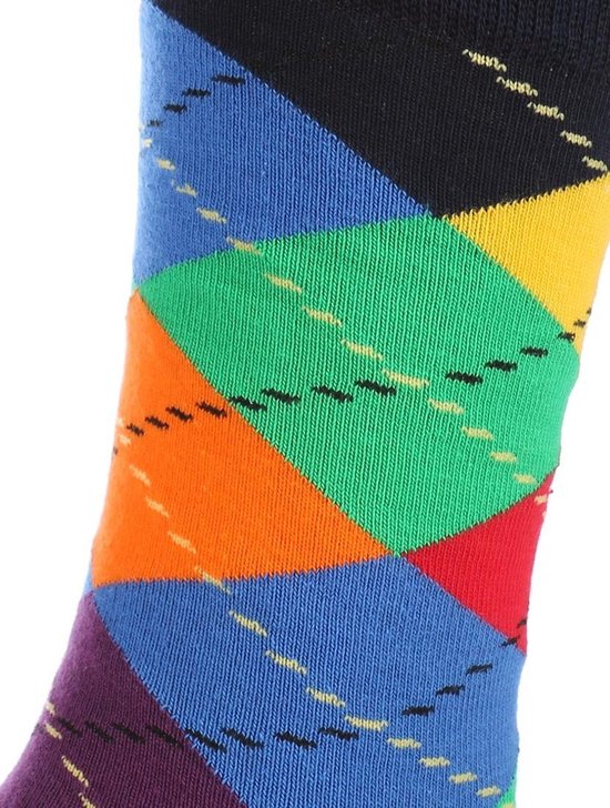 Detail van een donkerblauwe Happy Socks met grote turquoise, blauwe, witte en oranje stippen.