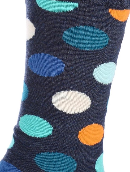 Detail van een donkerblauwe Happy Socks met grote turquoise, blauwe, witte en oranje stippen.