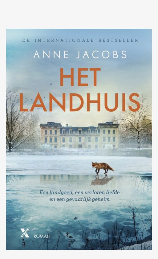 Boek "Het Landhuis" van Anne Jacobs, met een landhuis in de sneeuw en een vos op het ijs.