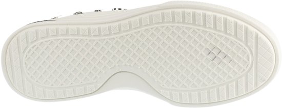 De witte rubberen buitenzool van een sneaker met een ruitvormig profiel.