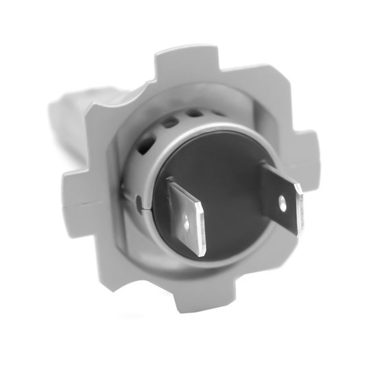 Close-up van de grijze adapter van een H7 LED-lamp met twee metalen pinnen.