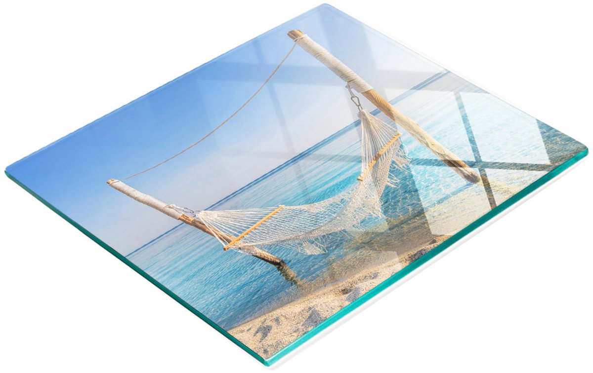 Decoratieve glazen snij- en serveerplank 'Hangmat aan zee' 60x52 cm