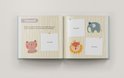 Een zwangerschapsdagboek met plek voor buikfoto's en illustraties van dieren.