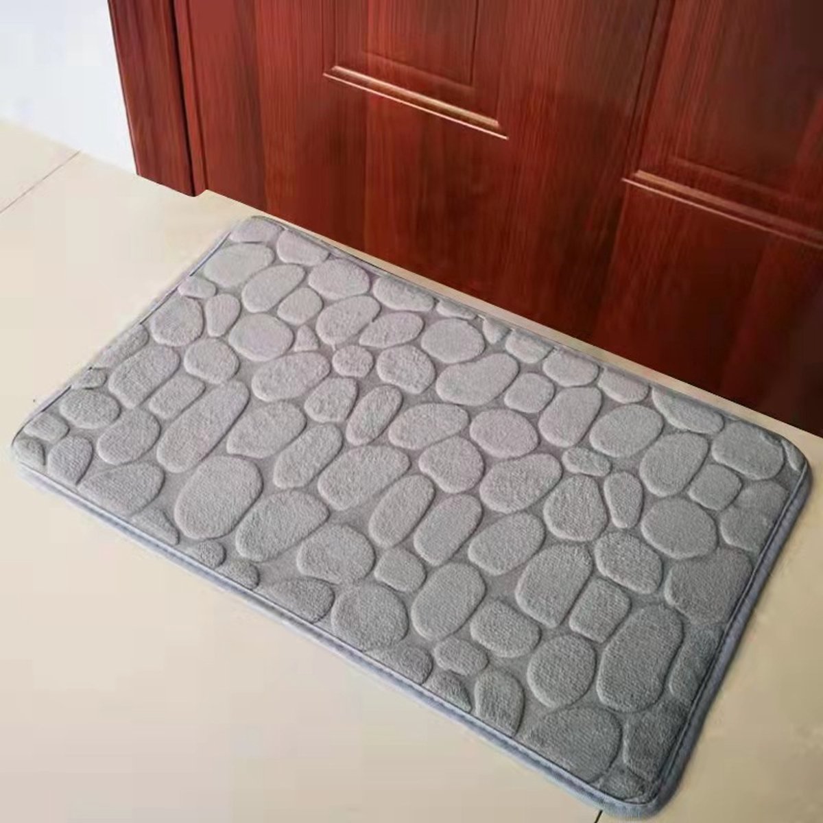 Badmat van koraalvlies met kiezelstructuur, absorberend en antislip, 40*60 cm.