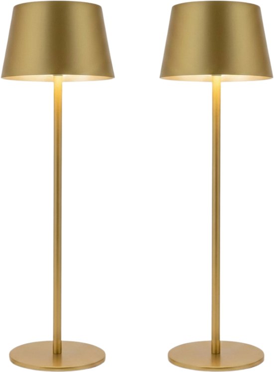 Deux lampes de table luxueuses, dorées et sans fil, au design épuré, sur fond blanc.
