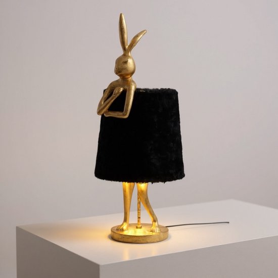 Gouden konijnenfiguur met zwarte, pluizige lampenkap, 65cm hoog. Verlicht van onderaf.