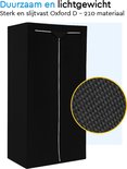 Housse de rangement noire, en matériau Oxford D-210 résistant, avec ourlet et fermeture éclair blanche.