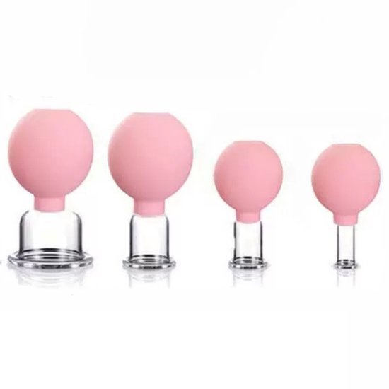 Vier roze gezichtscuppingsglazen met glazen bodem en rubberen pompen.