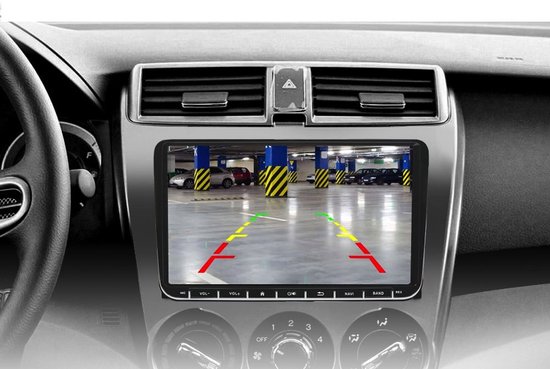 Autoradio in een auto, toont parkeerhulp met lijnen op een parkeergarage scherm.