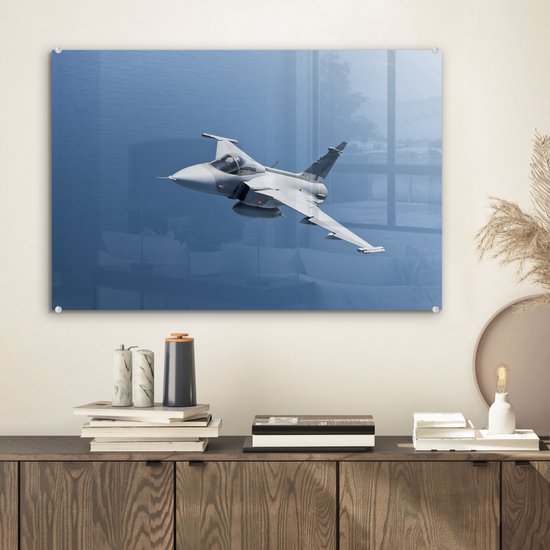 Un avion de chasse blanc dans un ciel bleu Plexiglas 60x40 cm - Tirage photo sur Glas (Décoration murale en plexiglas)