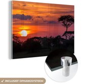 Vue du coucher de soleil dans le parc national du Serengeti en Tanzanie Plexiglas 120x80 cm - Tirage photo sur Glas (décoration murale en plexiglas)