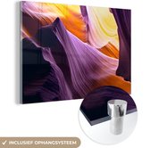 MuchoWow® Glasschilderij 90x60 cm - Schilderij acrylglas - Kleurrijke steen door het zonlicht in de Antelope Canyon - Foto op glas - Schilderijen