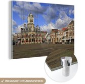 MuchoWow® Glasschilderij 30x20 cm - Schilderij acrylglas - Huis - Lucht - Delft - Foto op glas - Schilderijen