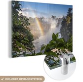 MuchoWow® Glasschilderij 180x120 cm - Schilderij acrylglas - Regenboog in het landschap van het Nationaal park Iguazú in Zuid Amerika - Foto op glas - Schilderijen