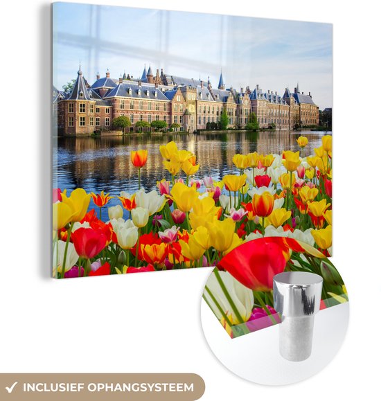 MuchoWow® Glasschilderij 120x90 cm - Schilderij acrylglas - Den Haag - Bloemen - Politiek - Foto op glas - Schilderijen