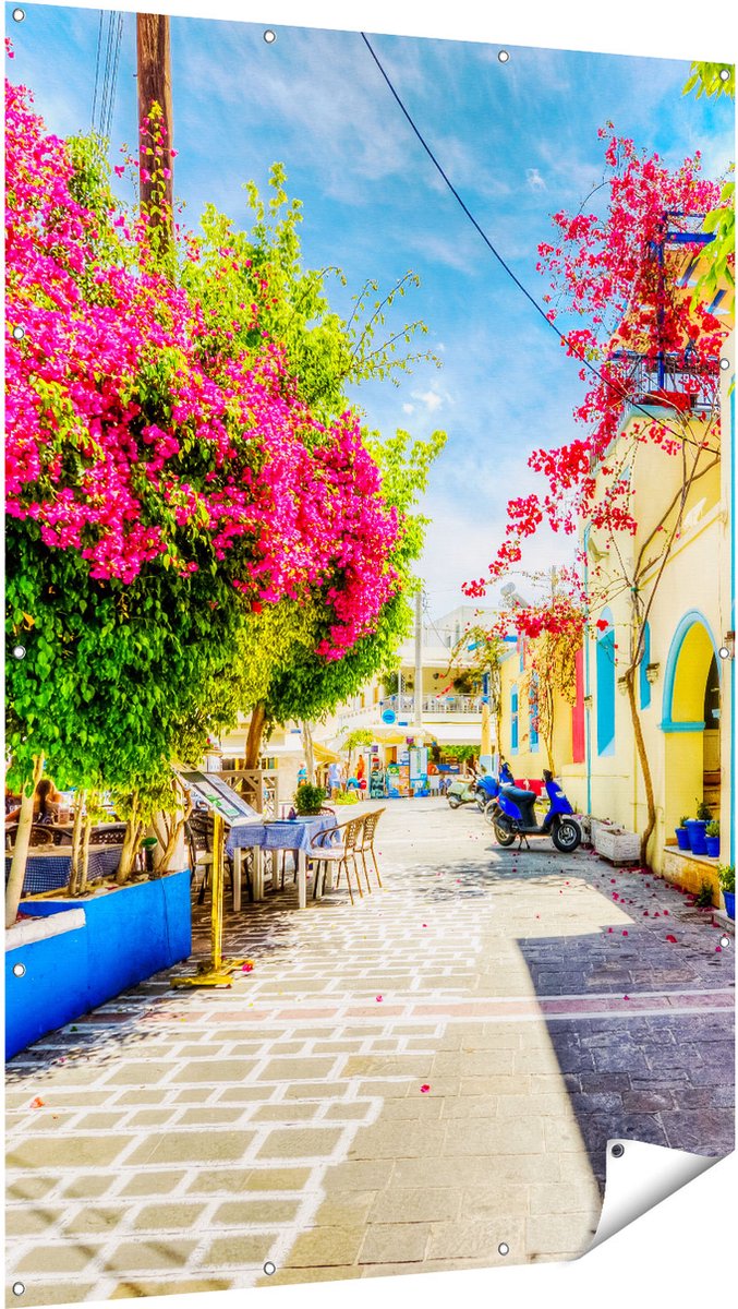 Gards Tuinposter Kleurrijke Straat op het Eiland Kos, Griekenland - 120x180 cm - Tuindoek - Tuindecoratie - Wanddecoratie buiten - Tuinschilderij Multikleur