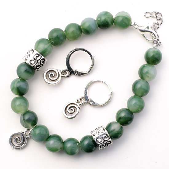 Set groene armband en oorbellen met spiraal