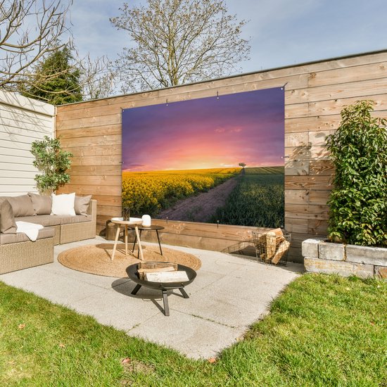 Tuinposter 180x120 cm - Tuindecoratie Bloemen - Weg - Lucht - Geel - Paars - Zonsondergang - Natuur - Poster voor in de tuin - Buiten decoratie - Schutting tuinschilderij - Tuindoek muurdecoratie - Wanddecoratie balkondoek