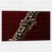 Muursticker - Deel van Zwart met Zilveren Hobo Blaas Instrument - 75x50 cm Foto op Muursticker