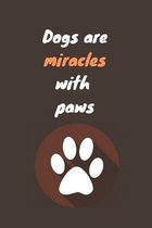 Dogs are miracles with paws: Notebook with a nice dog quote cover - 124 pages - 6x9 - wide ruled paper. Please read discribtion
