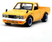 Maisto Datsun 620 PICK UP 1973 geel schaalmodel 1:24