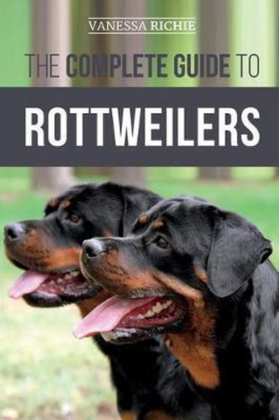 Twee rottweilers met hun tongen uit, voorpagina van 'The Complete Guide to Rottweilers'.