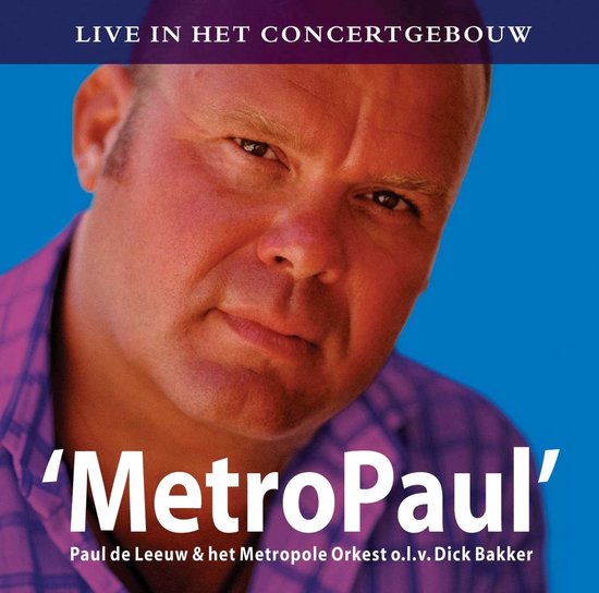 Close-up van Paul de Leeuw met paarse geruite blouse. 'MetroPaul' Live in Het Concertgebouw.