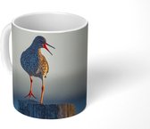 Mok - Een tureluur met de oceaan - 350 ML - Beker