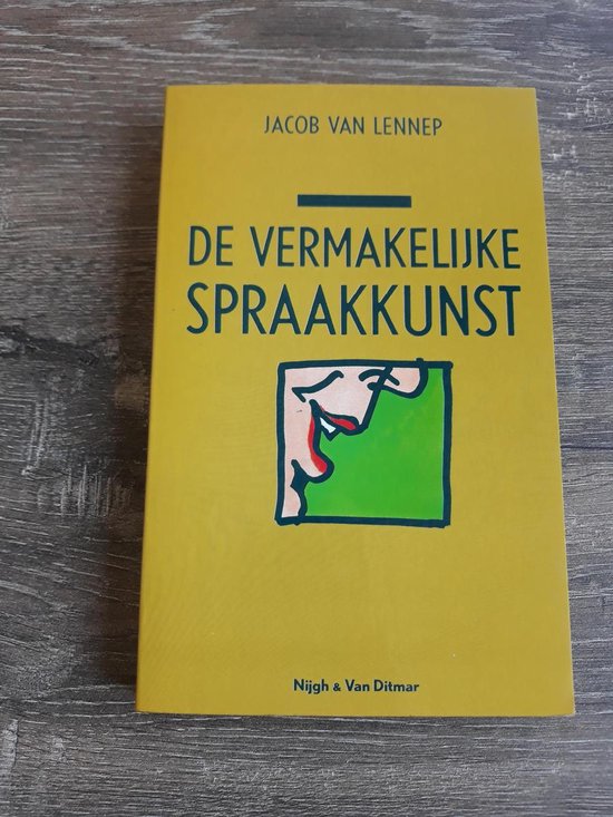 Gele kaft met de titel 'DE VERMAKELIJKE SPRAAKKUNST' en een illustratie van lippen en mond.